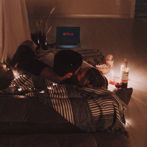 Couple Kissing on a Couch