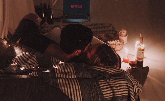 Couple Kissing on a Couch